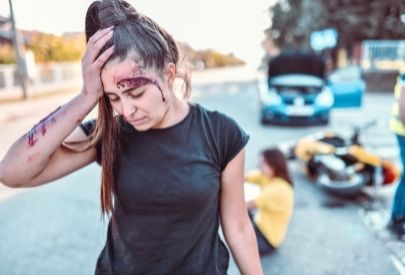 Girl Bleeding Due To Motorcycle accident | Hollingsworth & Hollingsworth Law Firm | San Diego